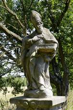 https://upload.wikimedia.org/wikipedia/commons/thumb/2/2b/Saint_Gothard_statue_in_Sezemice_02.jpg/800px-Saint_Gothard_statue_in_Sezemice_02.jpg