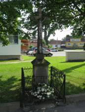 https://upload.wikimedia.org/wikipedia/commons/thumb/8/82/Wayside_cross_in_Budkov%2C_T%C5%99eb%C3%AD%C4%8D_District.JPG/800px-Wayside_cross_in_Budkov%2C_T%C5%99eb%C3%AD%C4%8D_District.JPG
